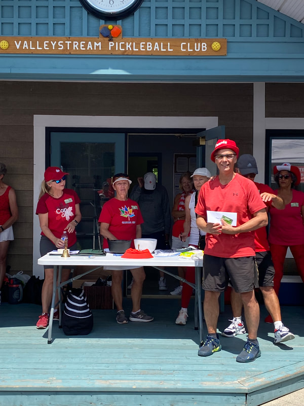 Prize-giving on the clubhouse deck